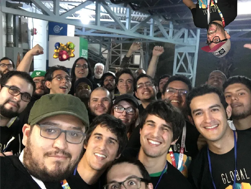 The Tree Interactive team with players at an event